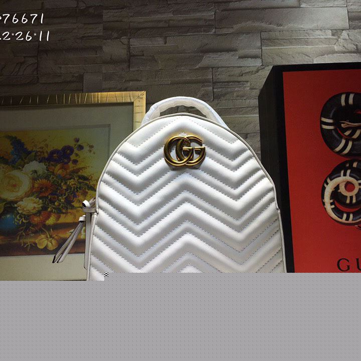 G*u*i backpacks